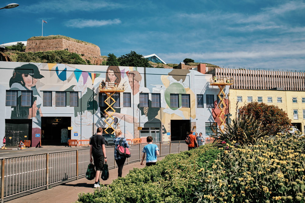 ARTHOUSE JERSEY'S HOME MURAL COMPLETELY TRANSFORMS NORMANS FACADE IN ST